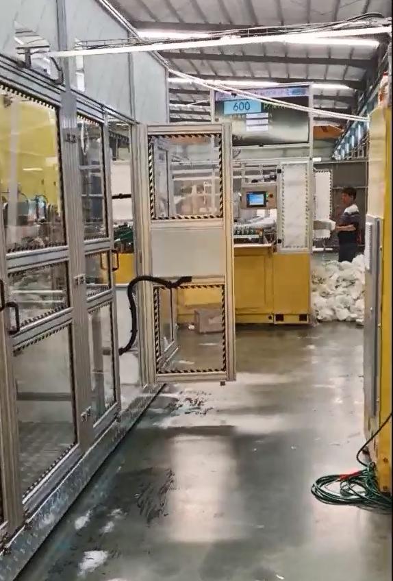 Линия по производству подгузников для талии с полным сервоприводом большого кольца Видео
